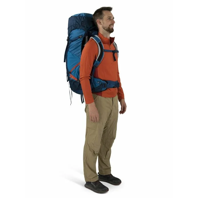 Osprey Atmos AG LT 65 worn by a standing hiker