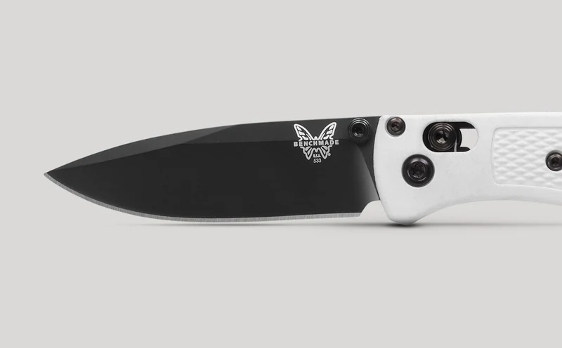 Side view of the Mini Bugout's black S30V drop-point blade