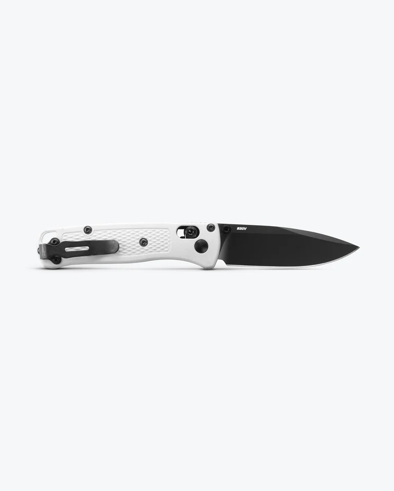 Benchmade Mini Bugout opened to show its white handle, black blade and deep-carry clip