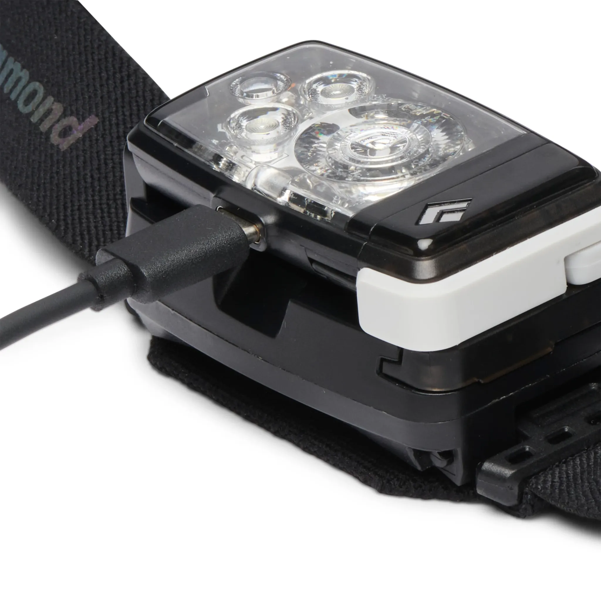 USB-C cable connected to the Black Diamond Distance LT 1100 housing