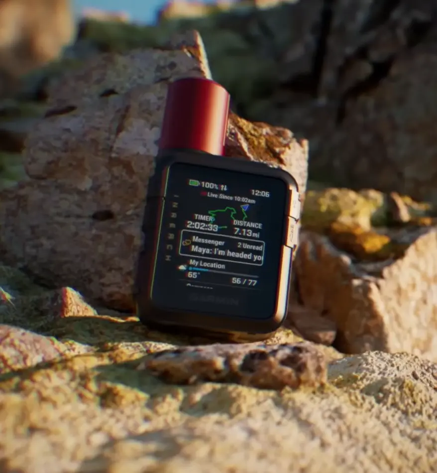 Garmin inReach Mini 3 Plus showing trail information on a rock