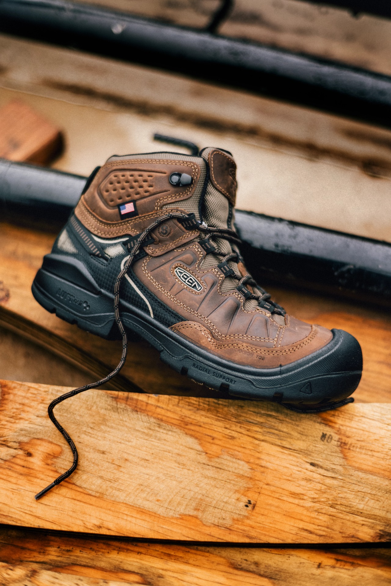 Side view of the KEEN Targhee IV Work boot with protective toe bumper