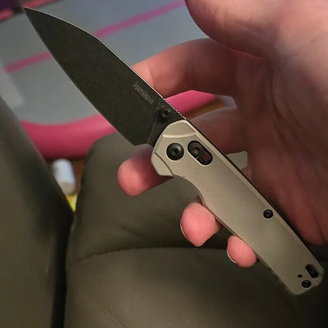 Kershaw Bel Air open in one hand, showing its compact size