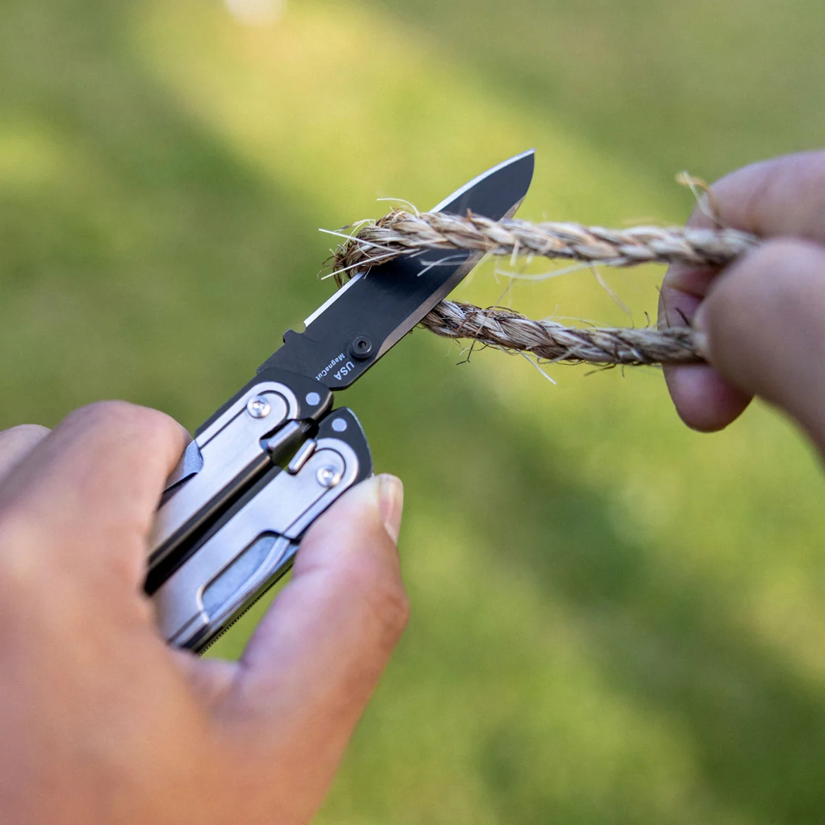 Leatherman ARC MagnaCut blade cutting rope outdoors