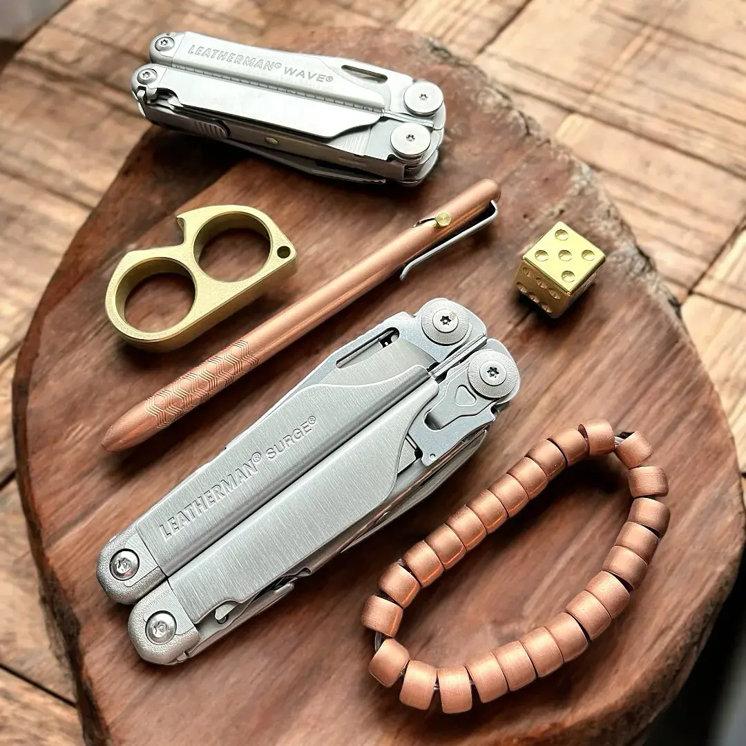Closed Leatherman Surge surrounded by workshop items
