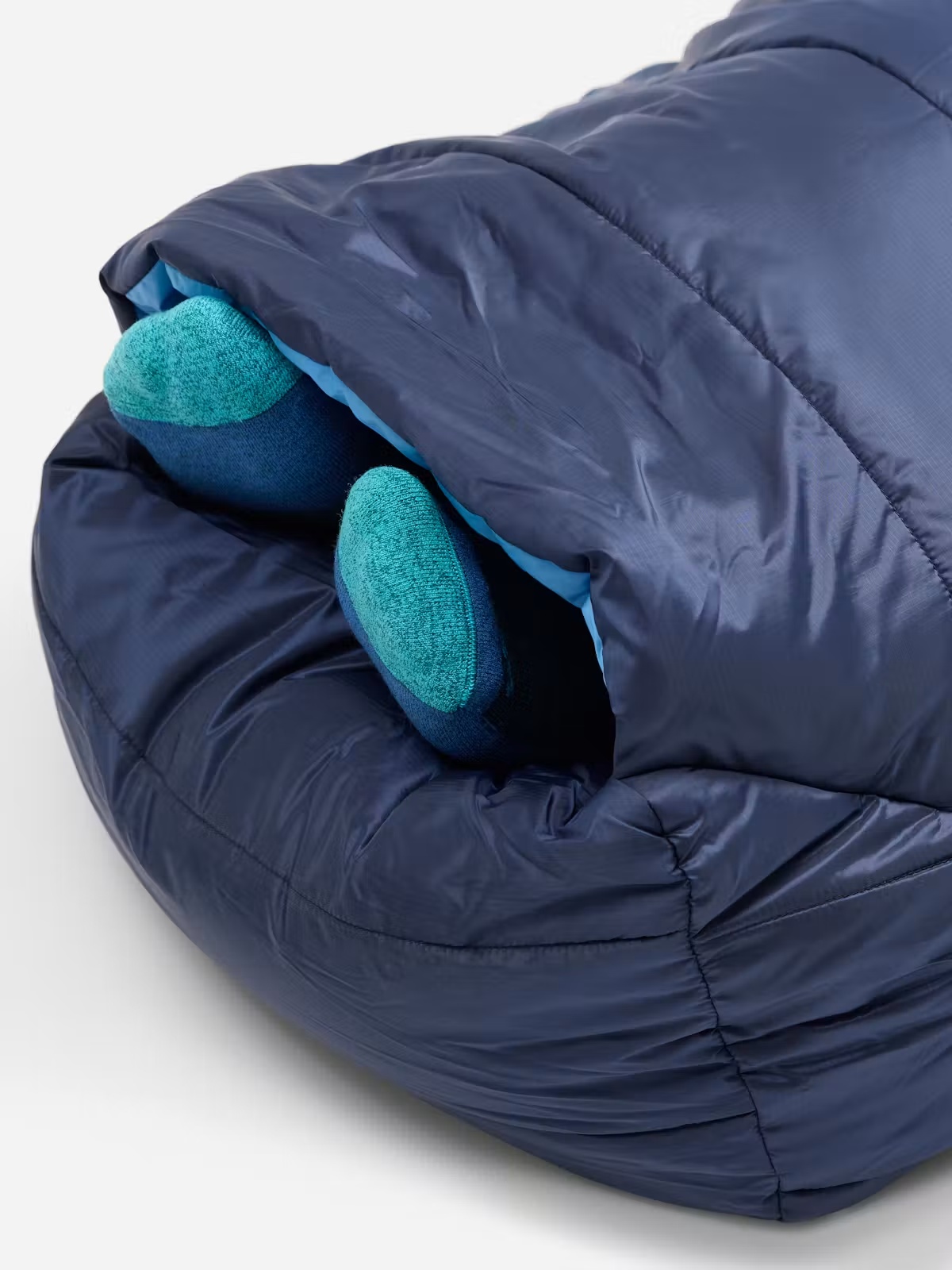 Feet extending through the Marmot Wraptor 30 foot vent
