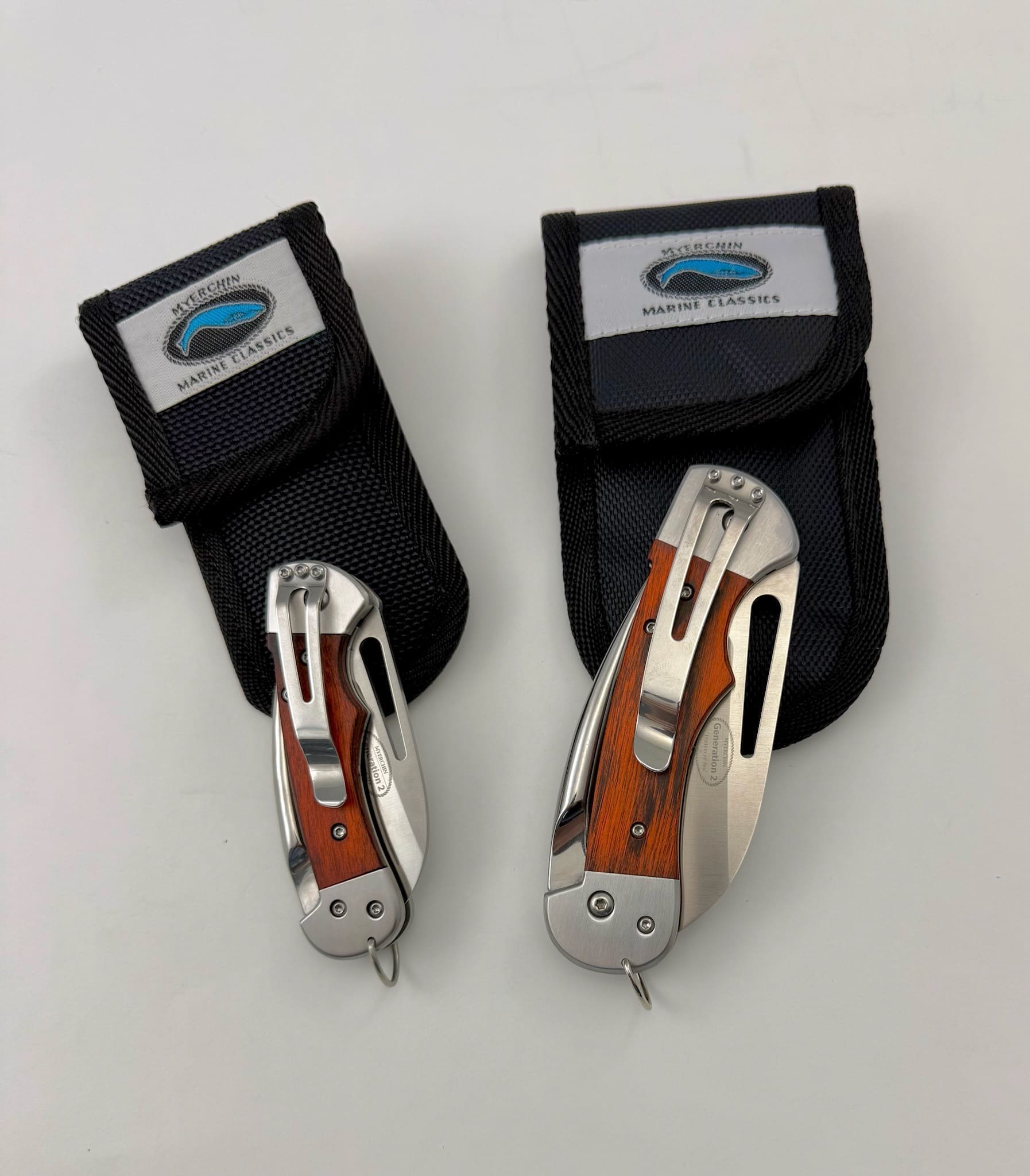 The Myerchin Captain Pro and smaller Crew with their clips and sheaths