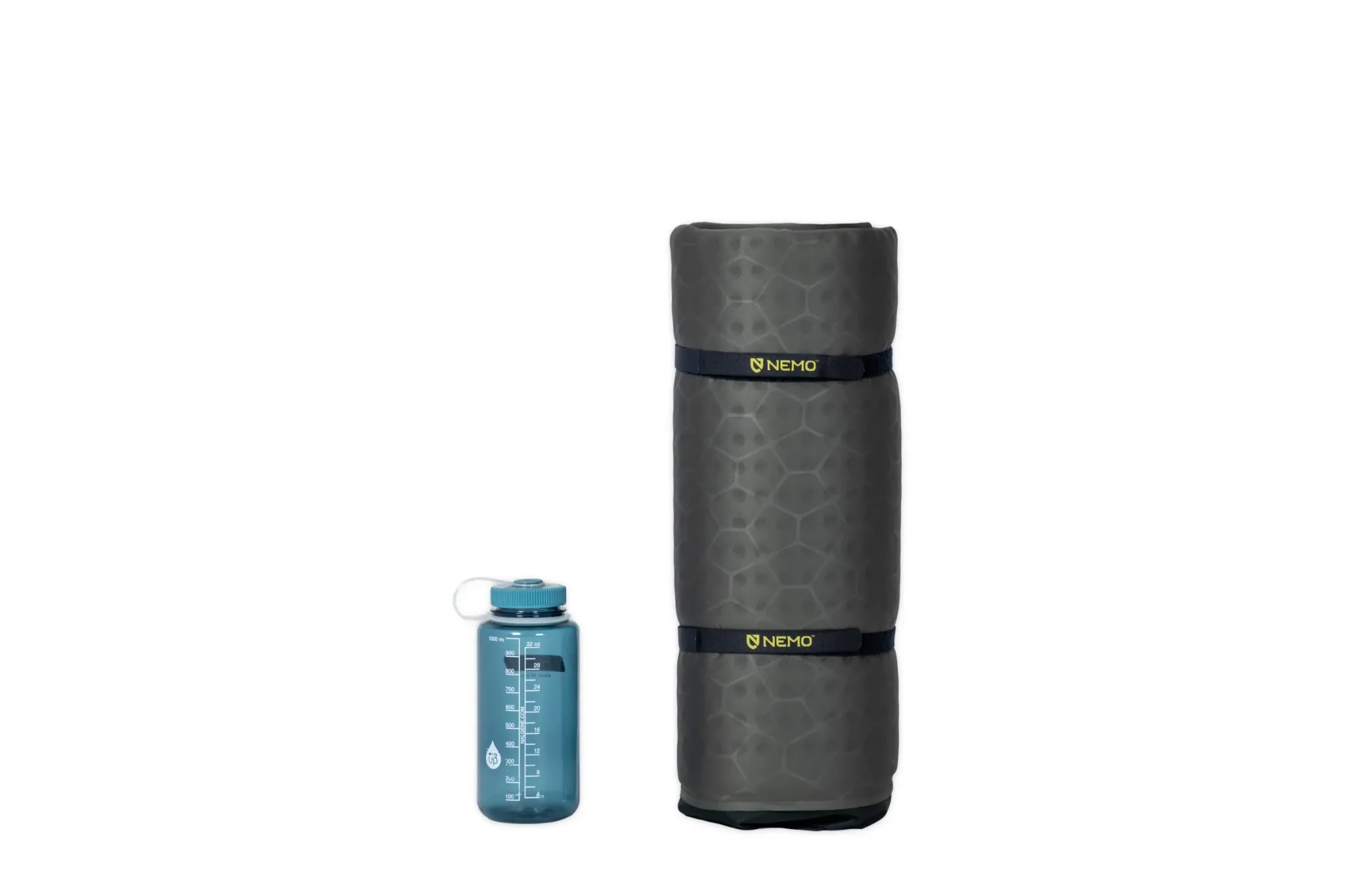 NEMO Roamer Single rolled for transport beside a one-litre bottle