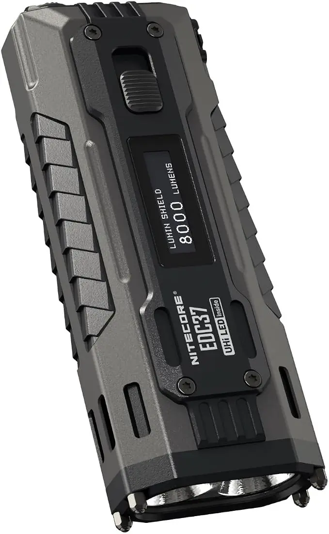 Angled close view of the Nitecore EDC37 showing its display, textured body and pointed front tips