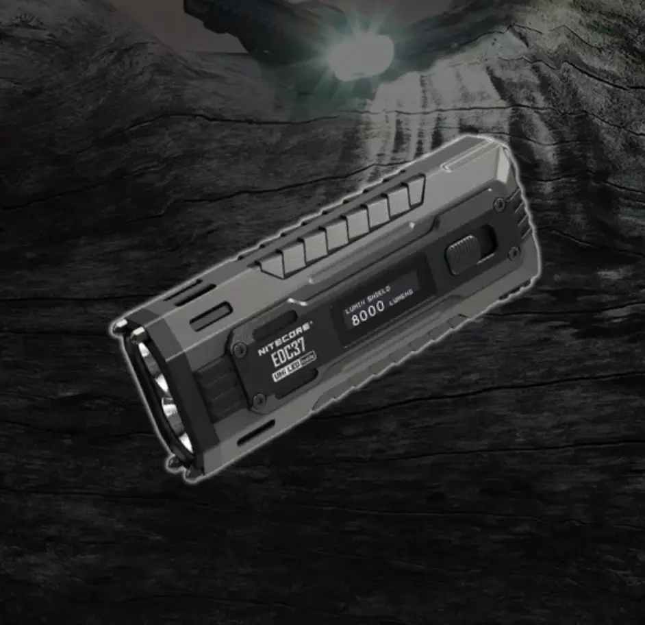 Nitecore EDC37 flashlight producing an intense white beam