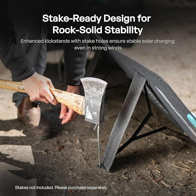 Stake being driven through a Renogy portable solar panel kickstand