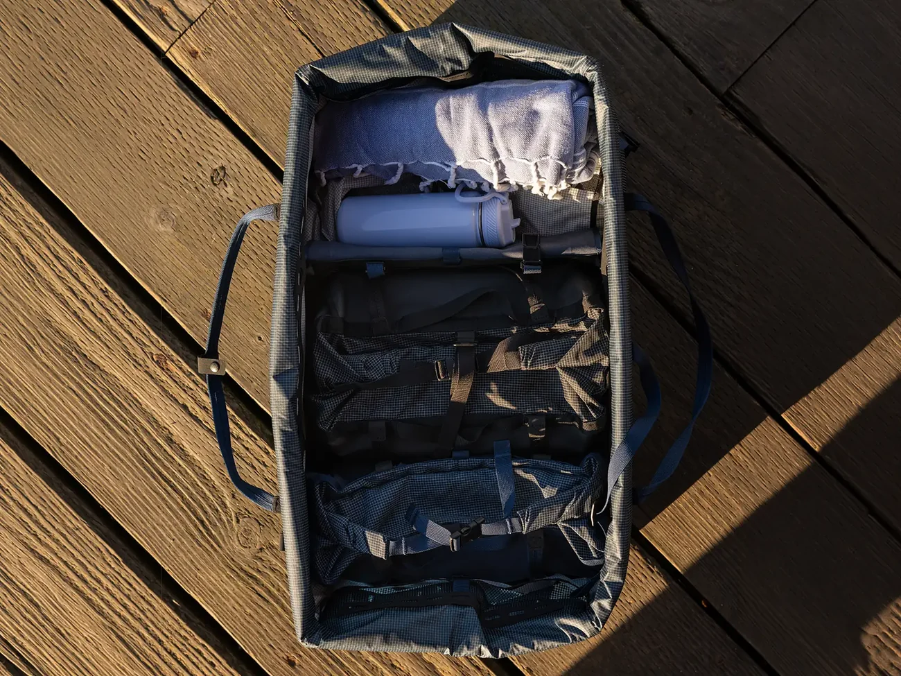 Open RUX Bag 25L with smaller items arranged inside