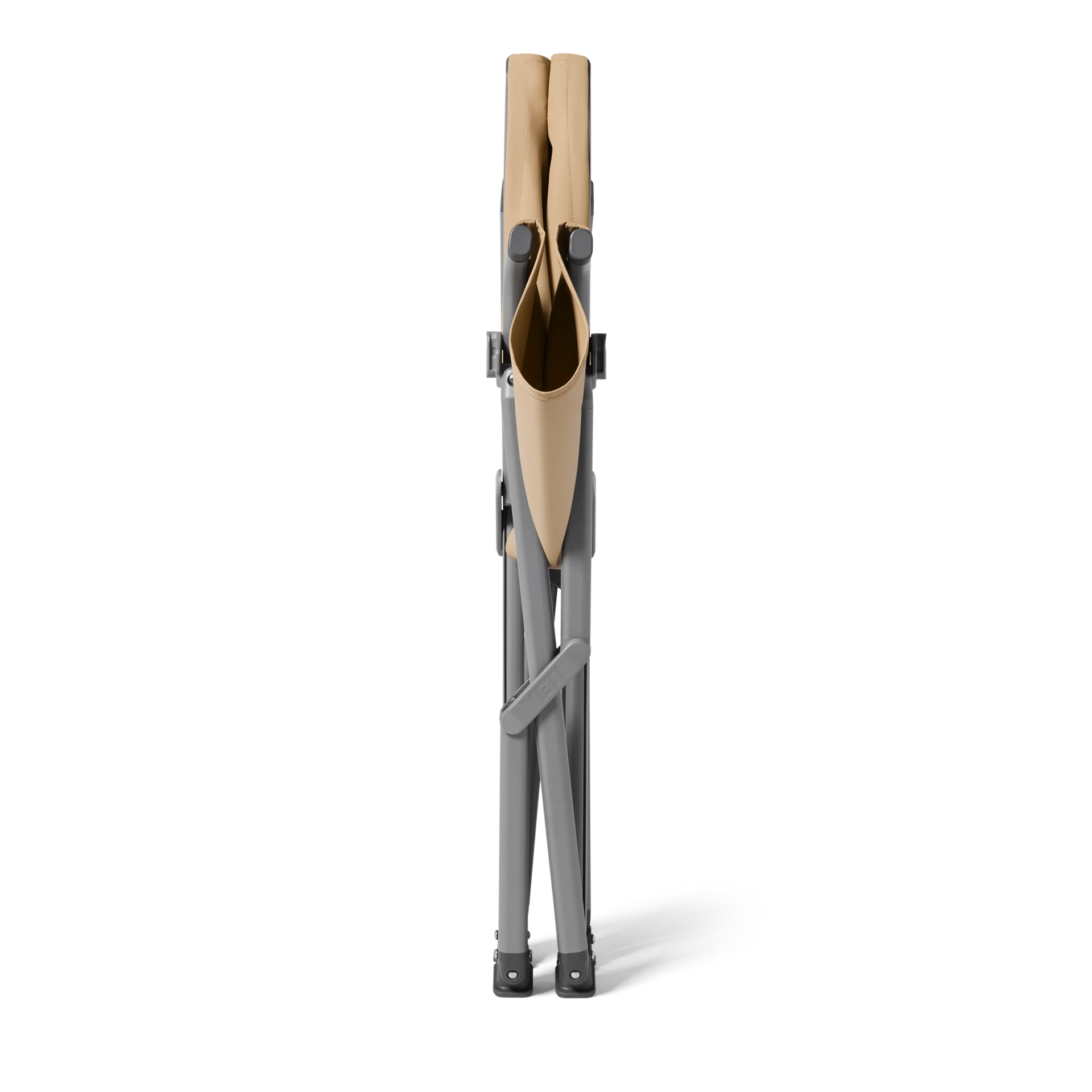 Tan Trailhead Field Chair folded into a narrow bundle
