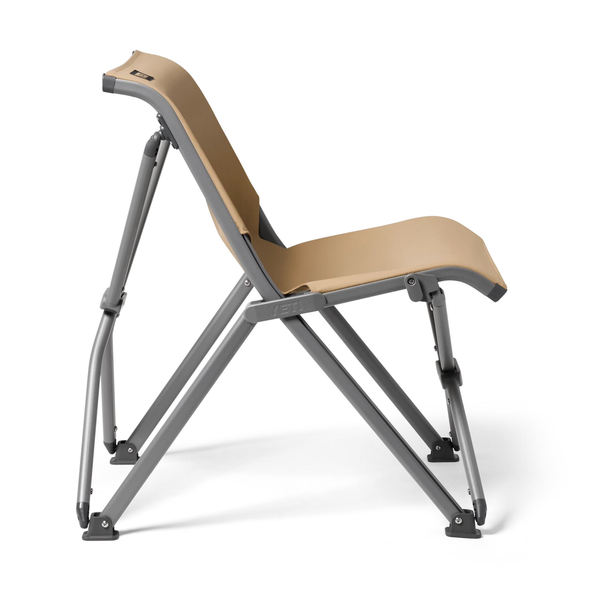 Side profile of the tan Trailhead Field Chair